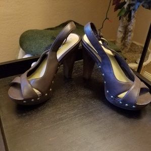 Brown platform heels with stud details